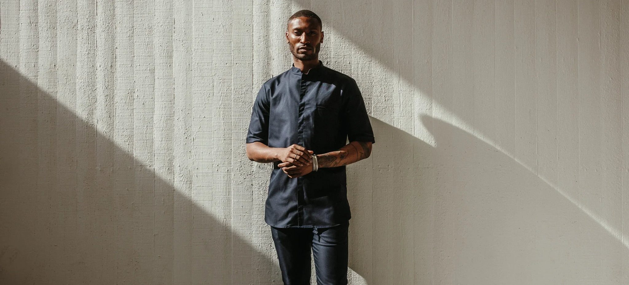 A black chef coat: a mark of experience and leadership